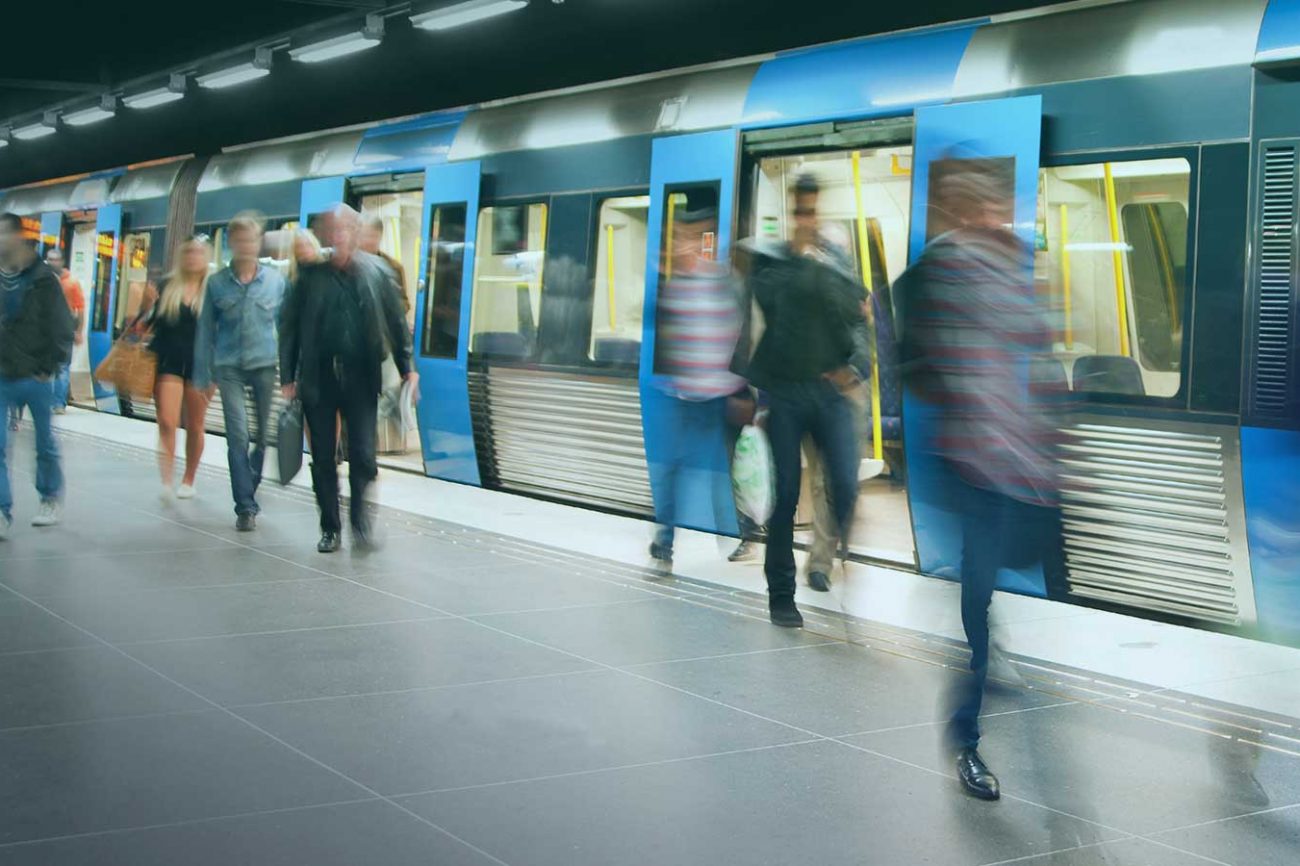 Train-with-blur-of-people Mobility data transit